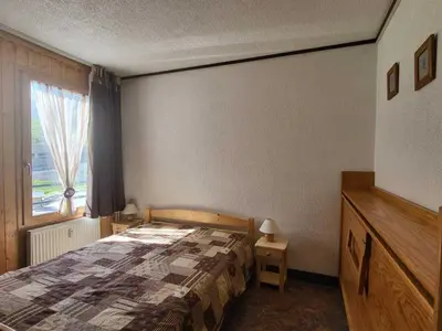 Un ou plusieurs lits dans un hébergement de l'établissement T2 Sud/Ouest avec Wifi à Tignes, 5 couchages, vue montagne - FR-1-449-185
