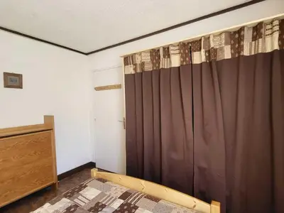 Un ou plusieurs lits dans un hébergement de l'établissement T2 Sud/Ouest avec Wifi à Tignes, 5 couchages, vue montagne - FR-1-449-185