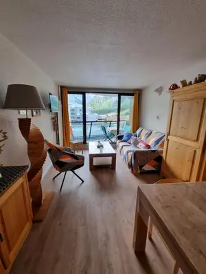Coin salon dans l'établissement Appartement au pied des pistes