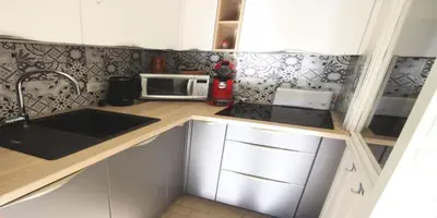 Cuisine ou kitchenette dans l'établissement Résidence Le Dahut - Studio pour 4 Personnes MAE-9214
