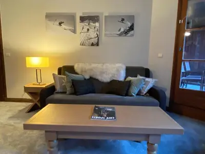 Coin salon dans l'établissement Arc 1950 - Appartement Premium Rénové - Manoir Savoie