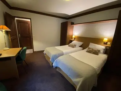 Un ou plusieurs lits dans un hébergement de l'établissement Arc 1950 - Appartement Premium Rénové - Manoir Savoie