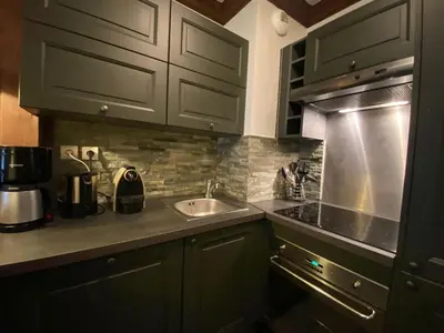 Cuisine ou kitchenette dans l'établissement Arc 1950 - Appartement Premium Rénové - Manoir Savoie