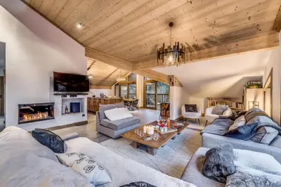 Coin salon dans l'établissement Résidence Les Terrasses De La Vanoise - 7 pièces duplex 14 personnes 5 MAE-9204