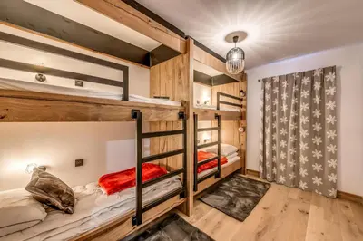 Un ou plusieurs lits dans un hébergement de l'établissement Résidence Les Terrasses De La Vanoise - 7 pièces duplex 14 personnes 5 MAE-9204
