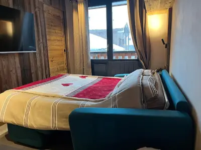 Un ou plusieurs lits dans un hébergement de l'établissement Appartement 4 à 5 personnes
