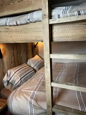Un ou plusieurs lits dans un hébergement de l'établissement Appartement 4 à 5 personnes