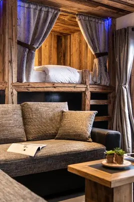 Un ou plusieurs lits dans un hébergement de l'établissement Chalet Saint Maurice - piscine privée & jacuzzi