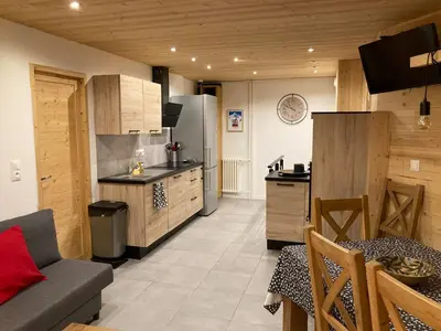 Cuisine ou kitchenette dans l'établissement MyHome - Génépis 36 - Super T4 8 pax skis aux pieds - Val Claret