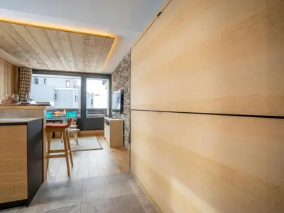 Coin salon dans l'établissement Apartment Les Grandes Platières - Val Claret-28 by Interhome