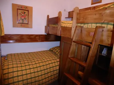 Un ou plusieurs lits dans un hébergement de l'établissement Appartement avec terrasse - Idéal famille près des pistes - FR-1-464-190