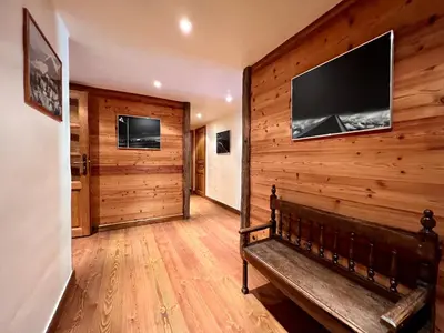Télévision ou salle de divertissement dans l'établissement Chalet Altus
