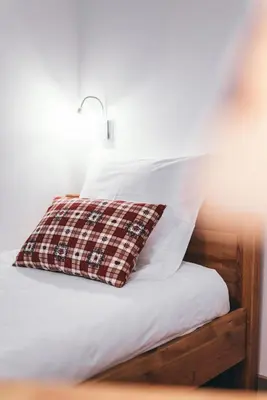 Un ou plusieurs lits dans un hébergement de l'établissement Appartement Orion by ExplorHome