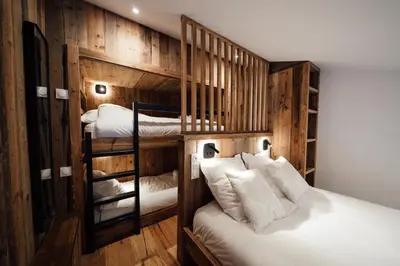 Un ou plusieurs lits dans un hébergement de l'établissement Studio Interlude by ExplorHome