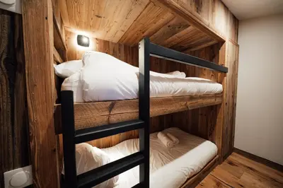 Un ou plusieurs lits dans un hébergement de l'établissement Studio Interlude by ExplorHome