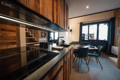 Cuisine ou kitchenette dans l'établissement Studio Interlude by ExplorHome