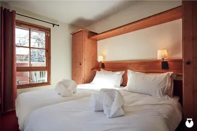 Un ou plusieurs lits dans un hébergement de l'établissement Tartiflat, Arc1950, 2 bed, Ski in Ski out, Arc 1950