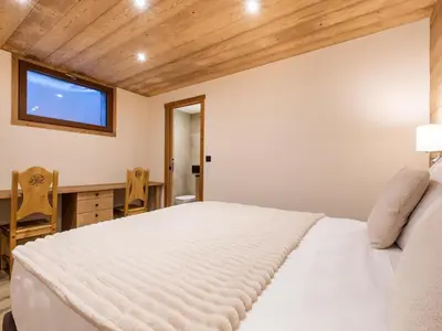 Un ou plusieurs lits dans un hébergement de l'établissement Luxurious chalet in the heart of Vanoise
