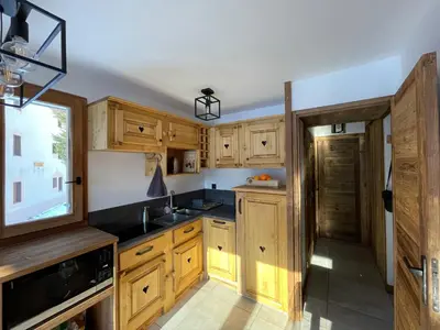 Cuisine ou kitchenette dans l'établissement Le Bouquetin 73