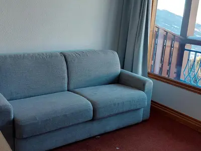 Coin salon dans l'établissement Appartement 2 pièces pour 4 pers. à Arc 1800, balcon et cuisine équipée - FR-1-411-840