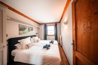 Un ou plusieurs lits dans un hébergement de l'établissement Big Tartiflat, Arc 1950, 2 bed ski-in ski-out