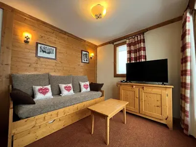 Télévision ou salle de divertissement dans l'établissement Appartement 6 pers, pied de pistes avec WiFi et parking - FR-1-508-256