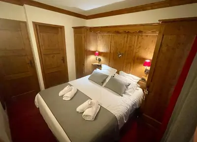 Un ou plusieurs lits dans un hébergement de l'établissement Arc 1950 - Appt 2CH - 6 pers - Rés 5* luxe - Piscine, sauna, hamman, jacuzzi - Classé 5 cristaux Paradiski