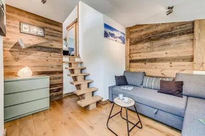 Coin salon dans l'établissement Résidence Hameaux De Toviere - Appartement élégant sur 3 niveaux - vue panoramique MAE-3034