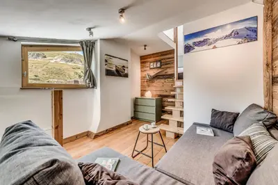 Coin salon dans l'établissement Résidence Hameaux De Toviere - Appartement élégant sur 3 niveaux - vue panoramique MAE-3034