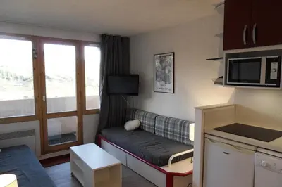 Cuisine ou kitchenette dans l'établissement Résidence Callisto - Appartement agréable · Accès direct aux pistes · Vue pistes et balcon MAE-9524