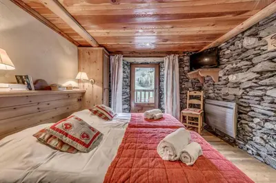 Un ou plusieurs lits dans un hébergement de l'établissement Chalet Les Champs Du Pont - LA GRANDE FERME 9 Pièces 15 pers. Appartement en chalet - 205m² MAE-6964