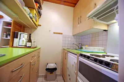 Cuisine ou kitchenette dans l'établissement Résidence Glaciers - Petit 2 pièces familial bien équipé MAE-6984