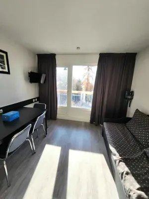 Un ou plusieurs lits dans un hébergement de l'établissement Résidences quartier Charmettoger - maeva Home - Studio + coin cabine 4 personnes - Confort MAE-0807