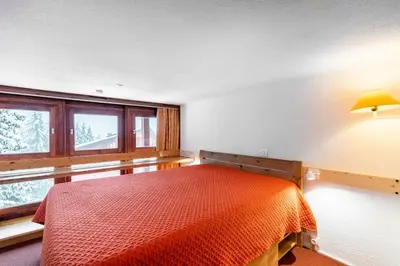 Un ou plusieurs lits dans un hébergement de l'établissement Résidences quartier Charmettoger - maeva Home - Appartement duplex 3 pièces 6 personnes Confort MAE-0814