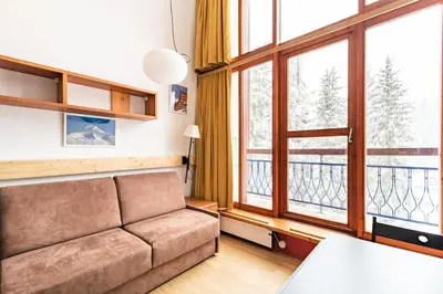 Coin salon dans l'établissement Résidences quartier Charmettoger - maeva Home - Studio 6 personnes - Confort MAE-0821