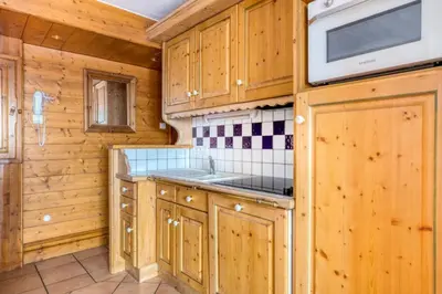 Cuisine ou kitchenette dans l'établissement Résidence Les Alpages de Chantel - maeva Home - Appartement 3 Pièces 6 Personnes - Sélection MAE-1538