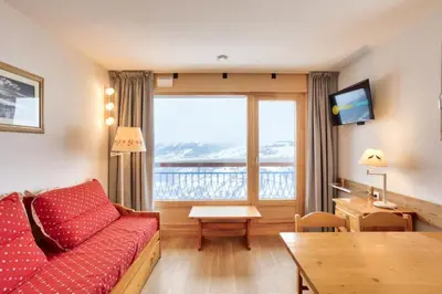 Coin salon dans l'établissement Résidences quartier Charmettoger - maeva Home - 2 Pièces 5 Personnes Sélection MAE-3657