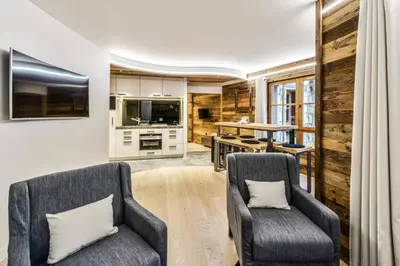 Coin salon dans l'établissement Résidence Les Arcs 1950 Le Village - maeva Home - Appartement 2 Pièces 6 Personnes - Prestige MAE-0444