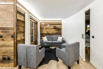 Coin salon dans l'établissement Résidence Les Arcs 1950 Le Village - maeva Home - Appartement 2 Pièces 6 Personnes - Prestige MAE-0444