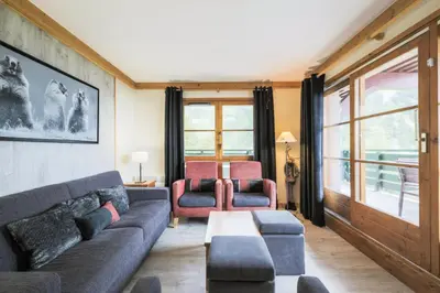 Coin salon dans l'établissement Résidence Les Arcs 1950 Le Village - maeva Home - Appartement 4 pièces 8 personnes - Prestige MAE-2160