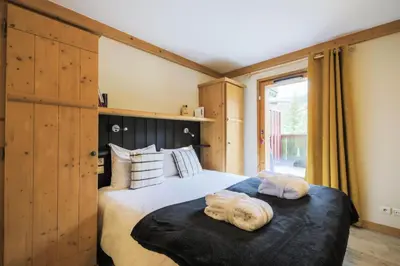Un ou plusieurs lits dans un hébergement de l'établissement Résidence Les Arcs 1950 Le Village - maeva Home - Appartement 4 pièces 8 personnes - Prestige MAE-2160