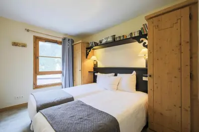Un ou plusieurs lits dans un hébergement de l'établissement Résidence Les Arcs 1950 Le Village - maeva Home - Appartement 4 pièces 8 personnes - Prestige MAE-2160