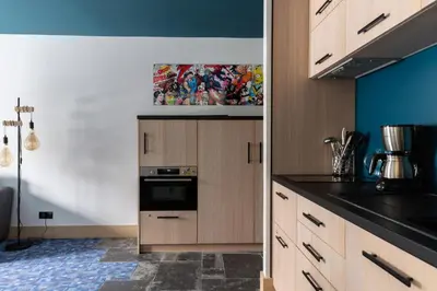 Cuisine ou kitchenette dans l'établissement Résidence Les Arcs 1950 Le Village - maeva Home - Appartement 2 pièces 4 personnes Prestige MAE-6302