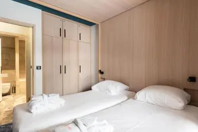 Un ou plusieurs lits dans un hébergement de l'établissement Résidence Les Arcs 1950 Le Village - maeva Home - Appartement 2 pièces 4 personnes Prestige MAE-6302