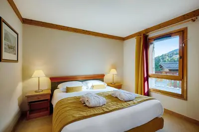 Un ou plusieurs lits dans un hébergement de l'établissement Résidence Les Arcs 1950 Le Village - maeva Home - 2 pièces 4 personnes Sélection MAE-9500