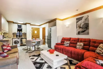 Coin salon dans l'établissement Résidence Les Arcs 1950 Le Village - maeva Home - Appartement 2 pièces 4 personnes Exclusive MAE-2311