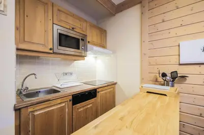 Cuisine ou kitchenette dans l'établissement Résidence Les Arcs 1950 Le Village - maeva Home - Appartement 2 pièces 4 personnes Sélection MAE-3657