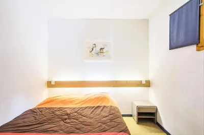 Un ou plusieurs lits dans un hébergement de l'établissement Résidences quartier Charmettoger - maeva Home - Appartement 3 pièces 6 personnes - Budget MAE-4507