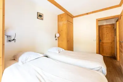 Un ou plusieurs lits dans un hébergement de l'établissement Résidence Les Arcs 1950 Le Village - maeva Home - Appartement 3 pièces 6 personnes Prestige MAE-4997