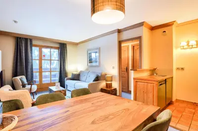 Coin salon dans l'établissement Résidence Les Arcs 1950 Le Village - maeva Home - Appartement 3 pièces 6 personnes - Prestige MAE-5091